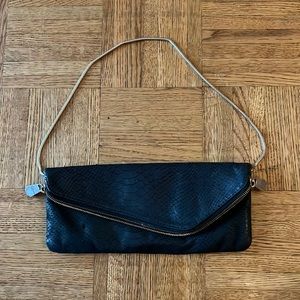 black leather clutch with removable gold chain strap